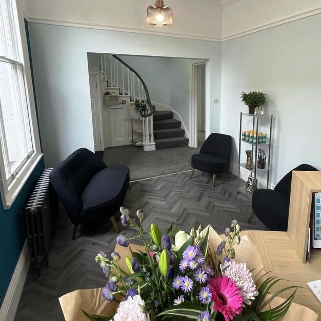 The reception area and cascading feature staircase inside LR Podiatry, Cathedral Quarter, Sheffield