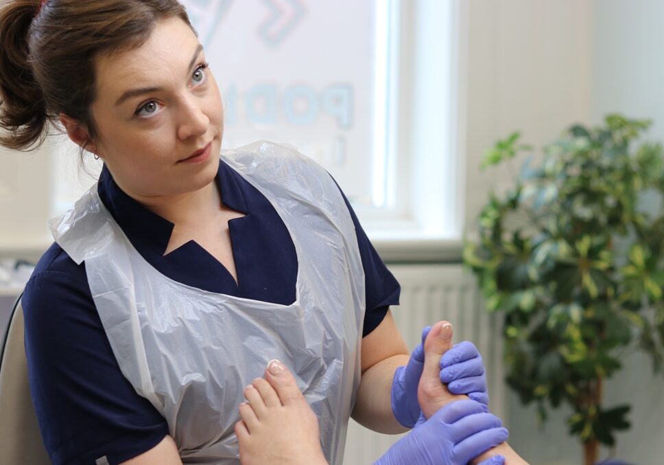 Emily Sharp of LR Podiatry, Sheffield treating a patient